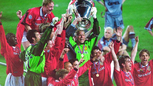 Captain Peter Schmeichel of Manchester United lifts the trophy after the Champions League final between Manchester United and Bayern Munich