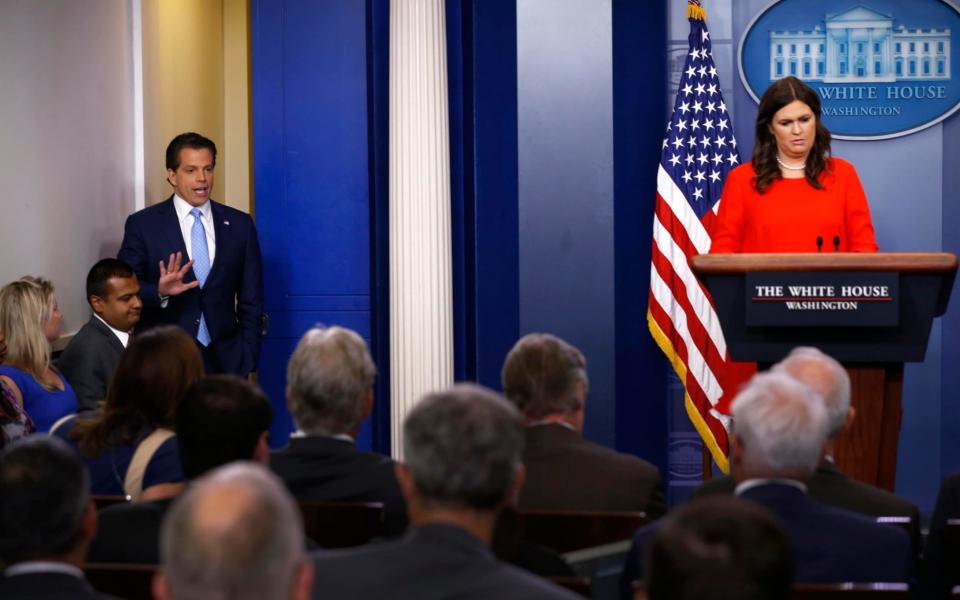 Deputy White House press secretary Sarah Huckabee Sanders, flanked by new White House communications director Anthony Scaramucci, holds the daily briefing at the White House in Washington - Credit: Jonathan Ernst/Reuters