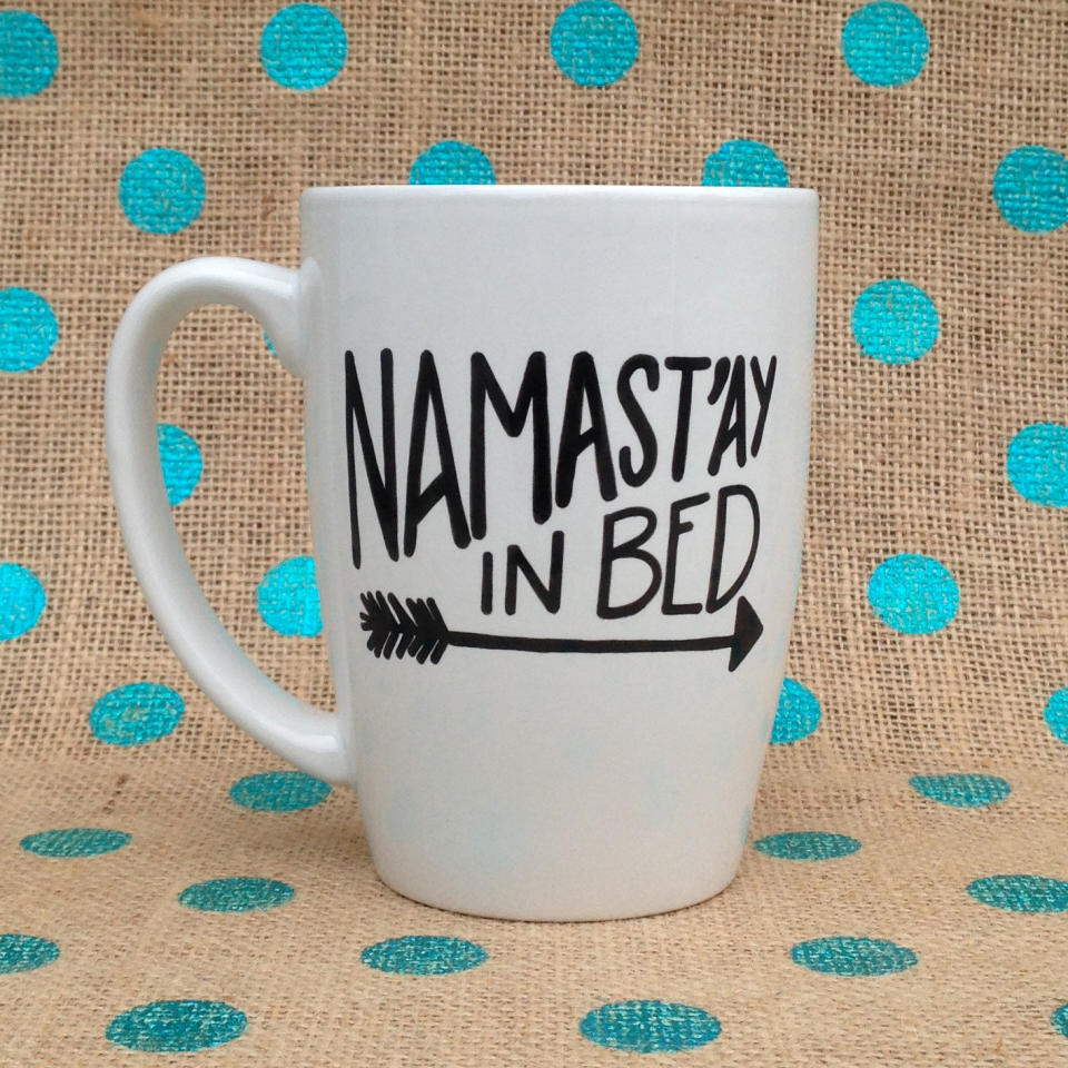 <a href="https://www.etsy.com/listing/230246304/funny-coffee-mug-namastay-in-bed">Namast'ay In Bed Mug, $16</a>