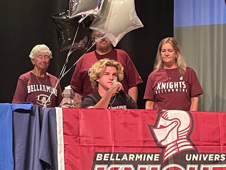 J.J. Luethje (seated) of Cocoa Beach football thanks those in attendance after signing with Bellarmine on May 8, 2024.