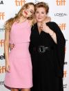 <p>Lily-Rose Depp and Camille Griffin keep close at the <em>Silent Night</em> premiere during the Toronto International Film Festival on Sept. 16. </p>