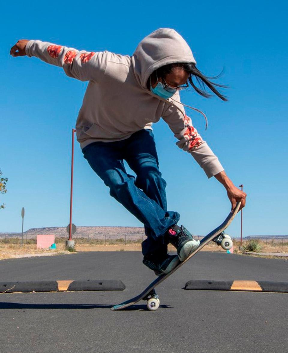 This undated photo provided by Paul Molina in August 2022 shows Terrill Humeyestewa performing a trick on a skateboard on the Hopi reservation in northeastern Arizona. Humeyestewa was among a handful of Hopi youth who worked together to create a skate spot that opened this spring in the Village of Tewa.
