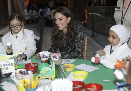 Britain's Catherine, Duchess of Cambridge attends a children's tea party with pupils from Oakington Manor Primary School in Wembley, at the Natural History Museum in London, Britain November 22, 2016. REUTERS/Yui Mok/Pool