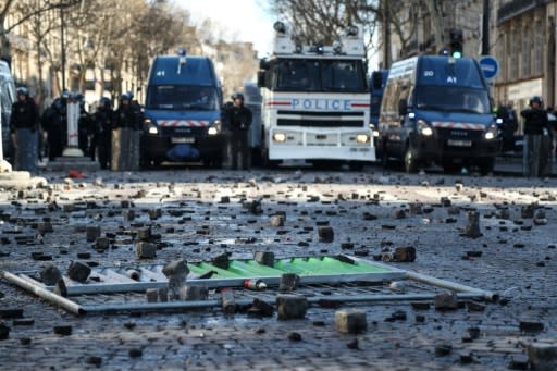 Rioters tore up cobblestones to hurl at the riot police