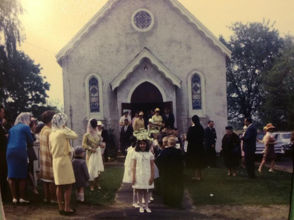 Lisa Petrillo, center, attending the old St. Catharine's Church in the late 1960s.