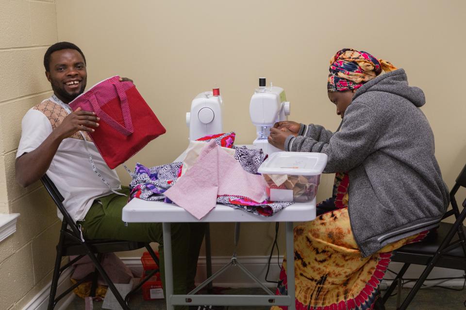 Teaching sewing skills is an important part of what Bridge Refugee Services does.