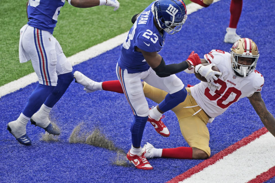 San Francisco 49ers' Jeff Wilson (30) scores a touchdown during the second half of an NFL football game against the New York Giants, Sunday, Sept. 27, 2020, in East Rutherford, N.J. (AP Photo/Corey Sipkin)
