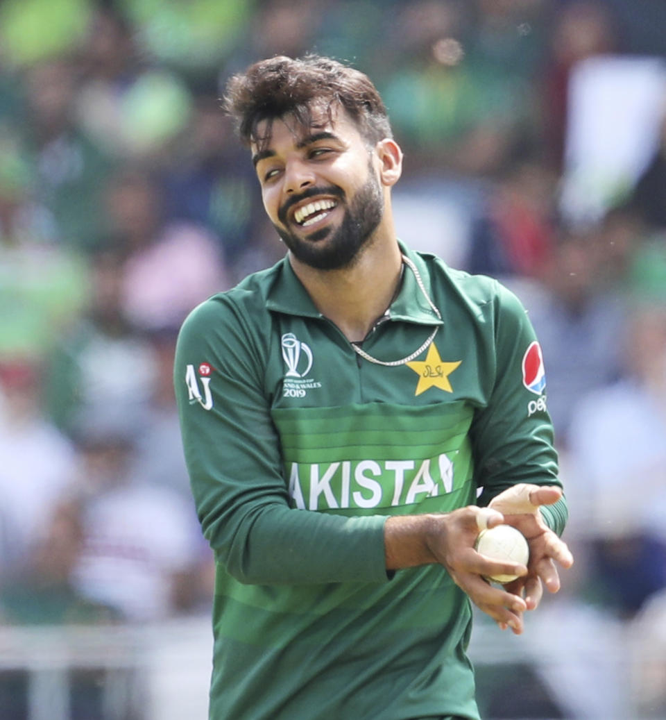 Pakistan's Shadab Khan prepares to bowl during the Cricket World Cup match between Pakistan and Afghanistan at Headingley in Leeds, England, Saturday, June 29, 2019. (AP Photo/Rui Vieira)