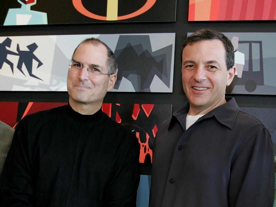 Steve Jobs, as Pixar Animation Studios CEO  with Walt Disney CEO Robert Iger (l-r), after announcement that Disney is buying Pixar, photo