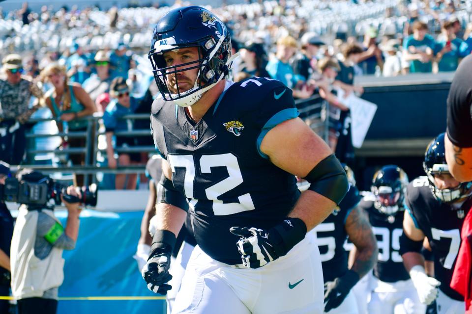 Jacksonville Jaguars offensive tackle Walker Little (72) runs on the field before an NFL football matchup Sunday, Nov. 19, 2023 at EverBank Stadium in Jacksonville, Fla. The Jacksonville Jaguars defeated the Tennessee Titans 34-14. [Corey Perrine/Florida Times-Union]