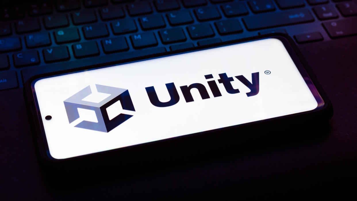  BRAZIL - 2021/10/12: In this photo illustration the Unity Technologies logo seen displayed on a smartphone on the background of a keyboard. (Photo Illustration by Rafael Henrique/SOPA Images/LightRocket via Getty Images). 