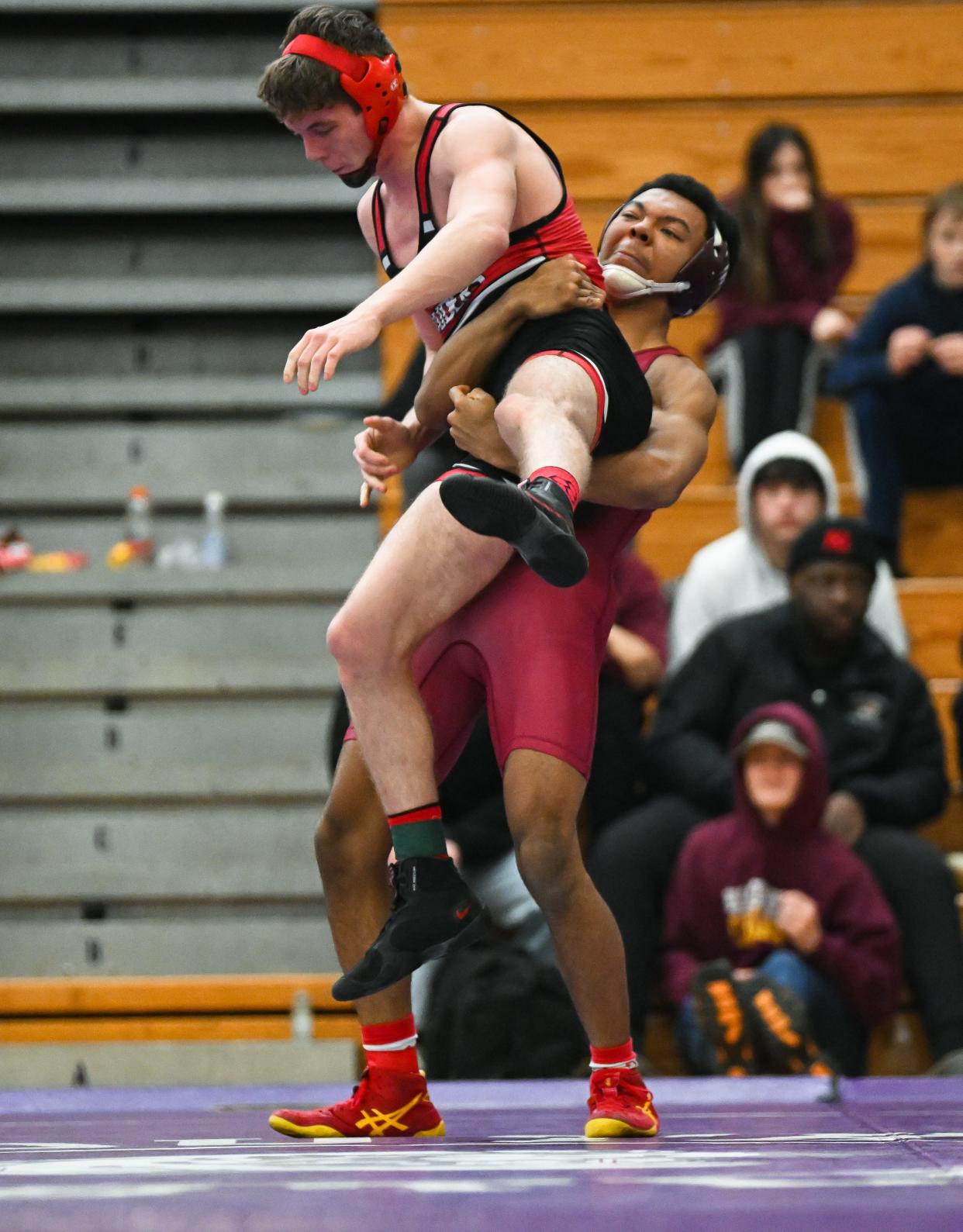 Bloomington North's Jeremiah Casillas wrestles against Southridge’s Maddox Vernon in the 165 pound first round during the IHSAA wrestling regional at Bloomington South on Saturday, Feb. 3, 2024.