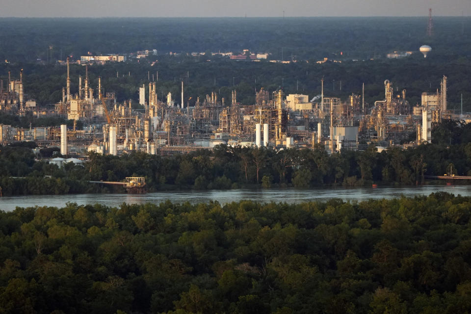 The community of Geismar is seen in the shadow of a chemical and petroleum industrial corridor, that is a known source of ethylene oxide emissions, in Ascension Parish, La., Friday, June 7, 2024. (AP Photo/Gerald Herbert)