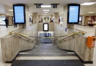 A closed access is pictured inside the Brussels central train station, November 22, 2015, after security was tightened in Belgium following the fatal attacks in Paris. REUTERS/Francois Lenoir