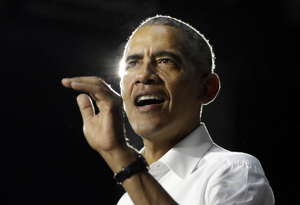 FILE - In this Nov. 2, 2018, file photo, former President Barack Obama speaks during a campaign rally for Democratic candidates in Miami. Nearly eight years after he was last on the ballot, Obama is emerging as a central figure in the 2020 presidential election. Democrats are eagerly embracing Obama as a political wingman for Joe Biden, who spent two terms by his side as vice president. Obama remains the party’s most popular figure, particularly with black voters and younger Democrats. (AP Photo/Lynne Sladky, File)