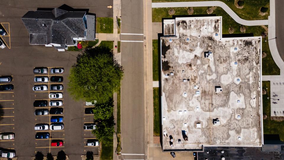 The site of the current Dover School Board is seen at top left, Wednesday, May 11.