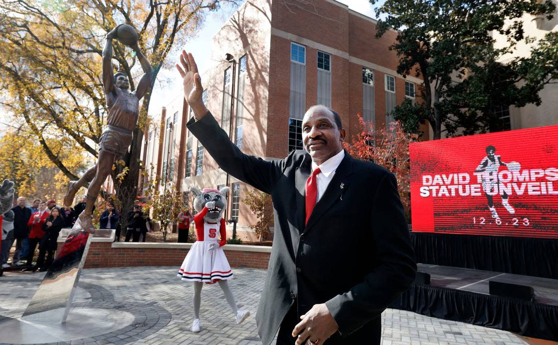 \N.C. State’s David Thompson acknowledges the crowd after his statue was unveiled outside Reynolds Coliseum in Raleigh, N.C., Wednesday, Dec. 6, 2023.