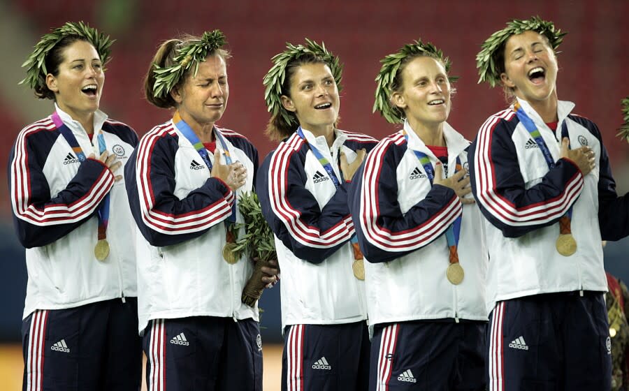 Members of the USA women's soccer team from left, Julie Foudy, Joy Fawcett, Mia Hamm, Kristine Lilly