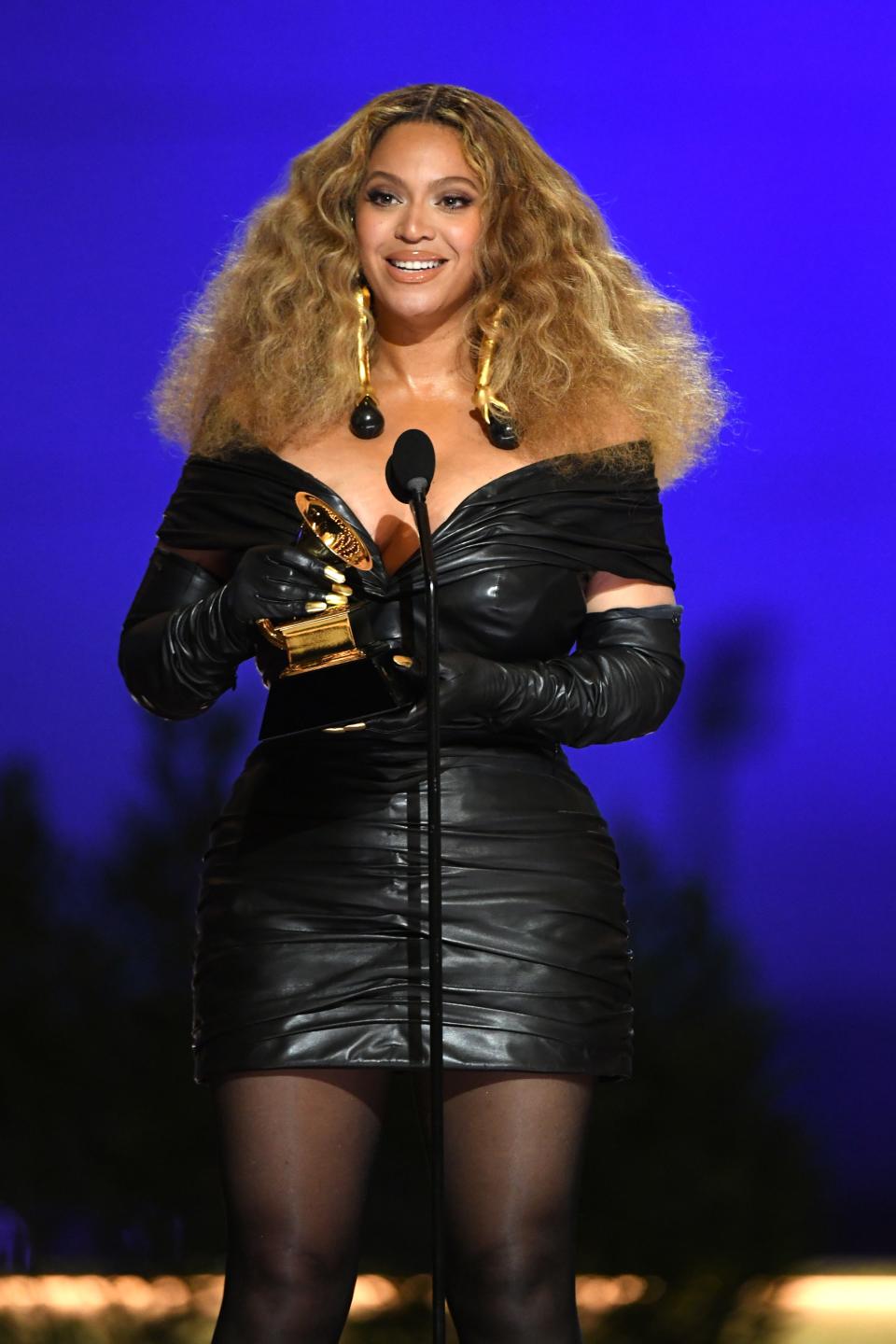 She made history! Beyoncé accepts the Best R&B Performance award for "Black Parade" onstage during the 63rd Annual GRAMMY Awards.