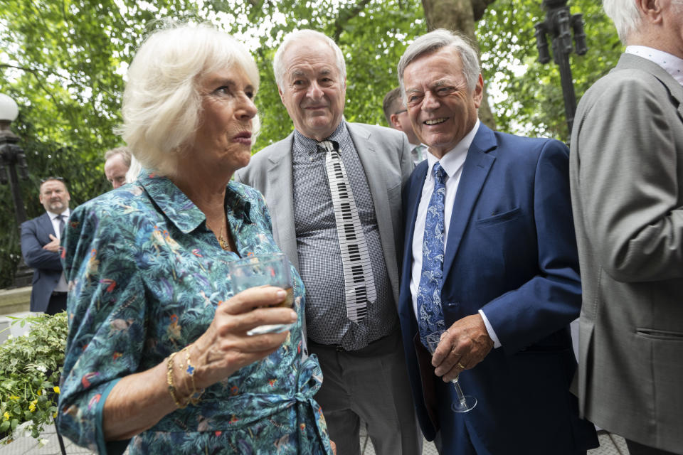 Tony Blackburn (right) with Paul Gambaccini at Camilla, Duchess of Cornwall's 75th birthday celebrations in 2022. (WPA Pool/Getty Images)