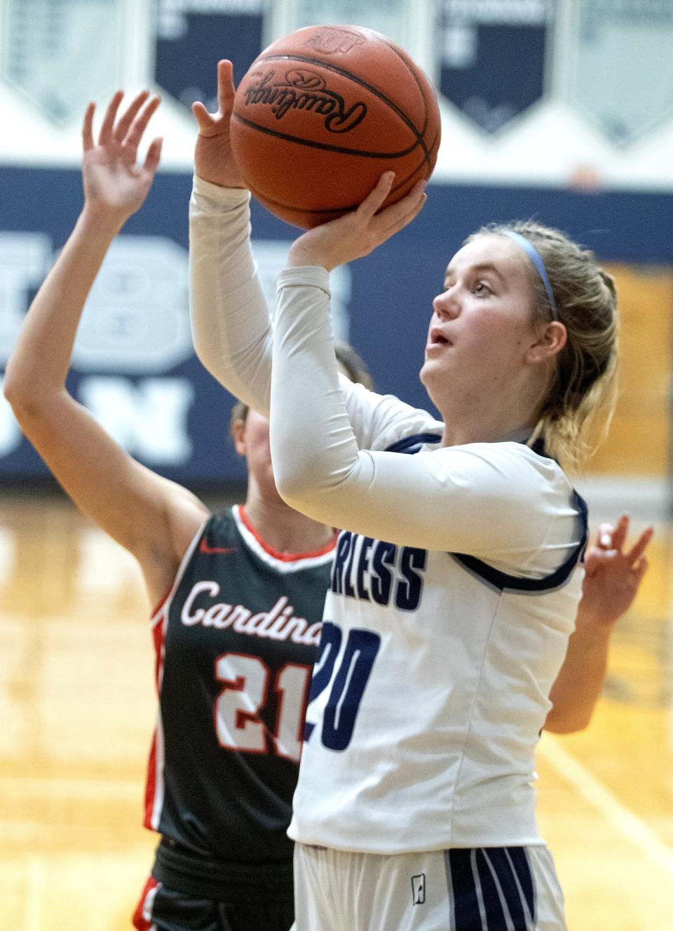 Fairless' Clara Snavely shoots with fpressure from Sandy Valley's Breeli Faiello during Monday's game.