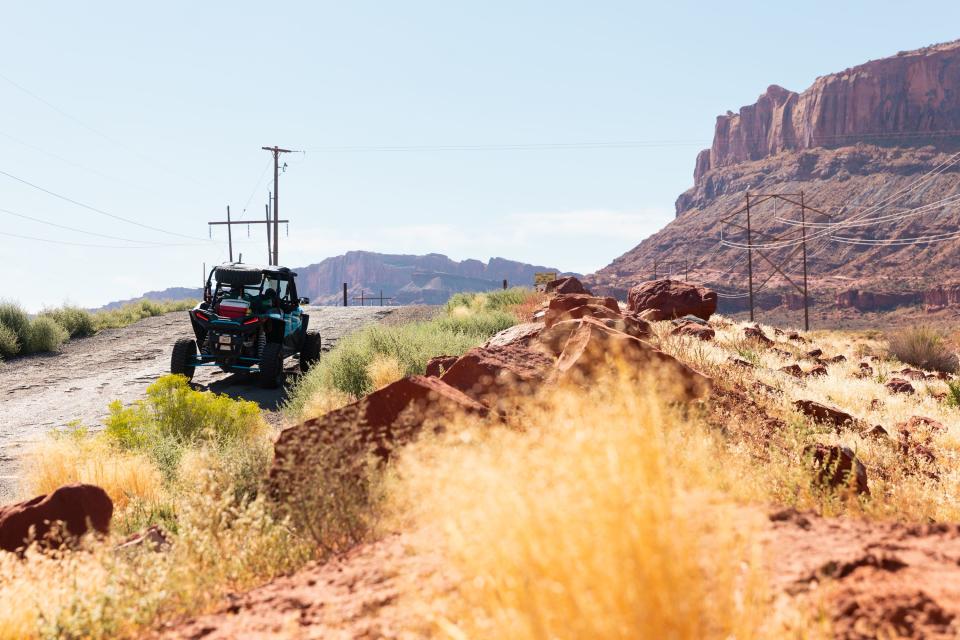 A UTV drives on the road towards Gemini Bridges, one of the areas that will be impacted by the Labyrinth Canyon and Gemini Bridges Travel Plan, in Moab on Friday, Sept. 22, 2023. The travel management plan from the Bureau of Land Management, which covers 300,00 acres near Moab, will be released by Sept. 30. | Megan Nielsen, Deseret News