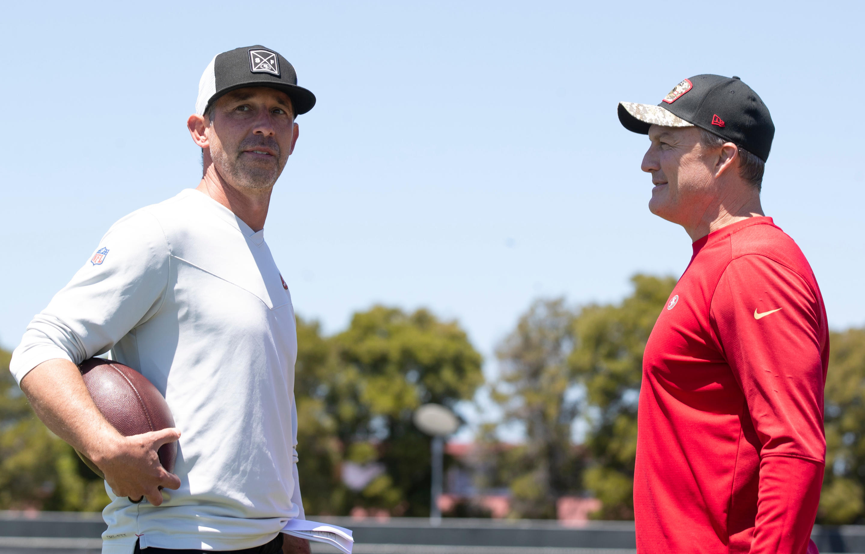 SANTA CLARA, CA - MAY 12: Head Coach Kyle Shanahan and General Manager John Lynch of the San Francisco 49ers during rookie training camp at the SAP Performance Facility on May 12, 2023 in Santa Clara, California.  (Photo by Michael Zagaris/San Francisco 49ers/Getty Images)