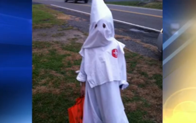 Three teenagers in Texas dressed in KKK garb for Halloween before