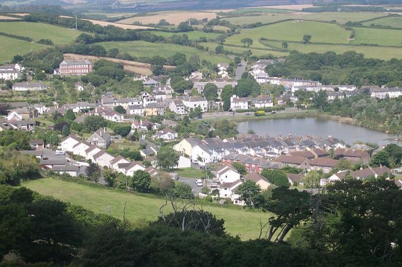 Millbrook seen from above, showing many houses sitting in a valley