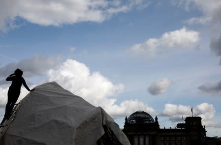 Climate activists set up a camp in Berlin one day before thousands are expected to gather at Berlin's Brandenburg Gate