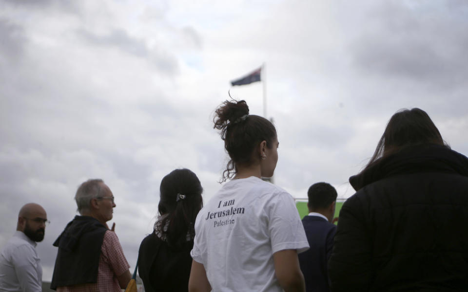 Around 50 pro-Palestinian demonstrators protest outside Parliament House in Canberra, Australia, on Wednesday, Feb. 26, 2020, ahead of Israeli President Reuven Rivlin's visit. The protest was organized by the Australia Palestine Advocacy Network which advocates for justice and peace for Palestinians. (AP Photo/Rod McGuirk)