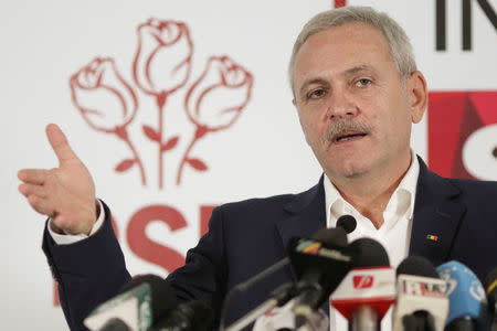 Leader of Romania's leftist Social Democrat Party (PSD), Liviu Dragnea, gestures during a press conference following the end of the parliamentary elections, in Bucharest, Romania, December 11, 2016. Inquam Photos/Octav Ganea/via REUTERS