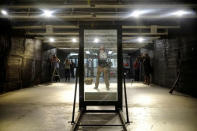 Armoured One Tactical Consultant Michael Poland poses after shooting one of the company's security glass for an active shooter preparedness drill demonstration at Rockland Indoor Shooting, in Pearl River, New York, U.S., December 12, 2017. REUTERS/Eduardo Munoz