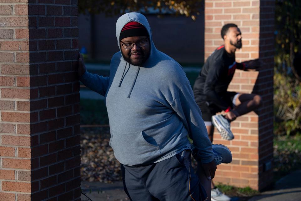 Fredrick Waggoner warms up before a run at Victor Ashe Park. He's involved in the new local chapter of Black Men Run, a national organization dedicated to improving health among Black men.