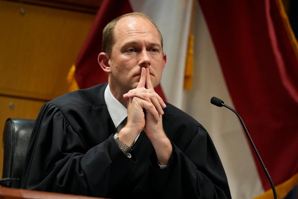 Judge Scott McAfee says the district attorney must step aside or remove the prosecutor (AP)