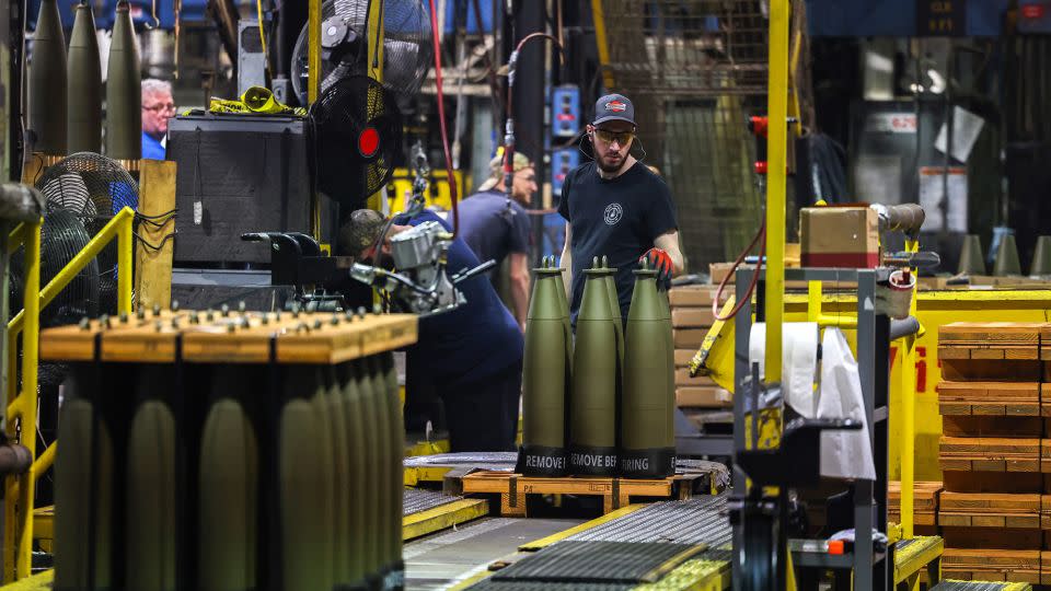 A worker prepares 155 mm caliber shells for shipment at the packaging area of the Scranton Army Ammunition Plant in Scranton, Pennsylvania on April 16, 2024. - Charly Triballeau/AFP/Getty Images