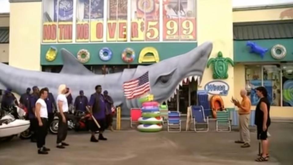 A screen shot from HBO’s “East Bound & Down” of actors Will Farrell and Danny McBride in front of a North Myrtle Beach store and a shark sculpture created by Bob Duato. Jason Lee/YouTube