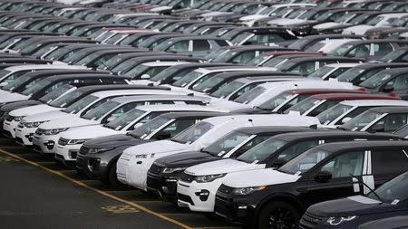 FILE PHOTO: New Land Rover cars are seen in a parking lot at the Jaguar Land Rover plant at Halewood in Liverpool, northern England, September 12 , 2016. REUTERS/Phil Noble/File Photo