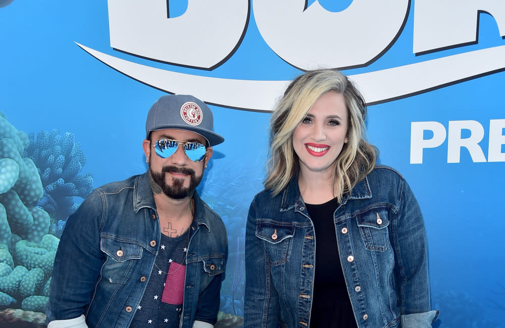 AJ McLean and his wife Rochelle Karidis with their daughter Elliott. credit:Bang Showbiz