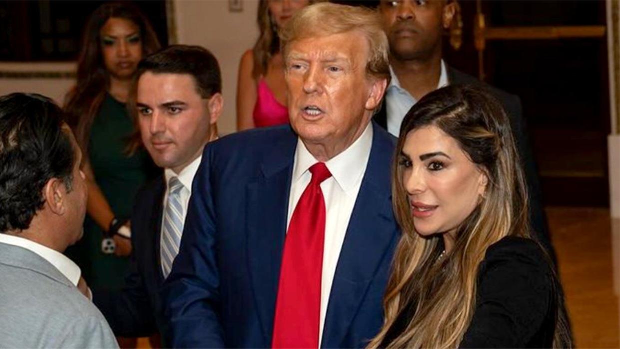 former president Donald J Trump RHONJ Siggy Flicker speaking in a crowd