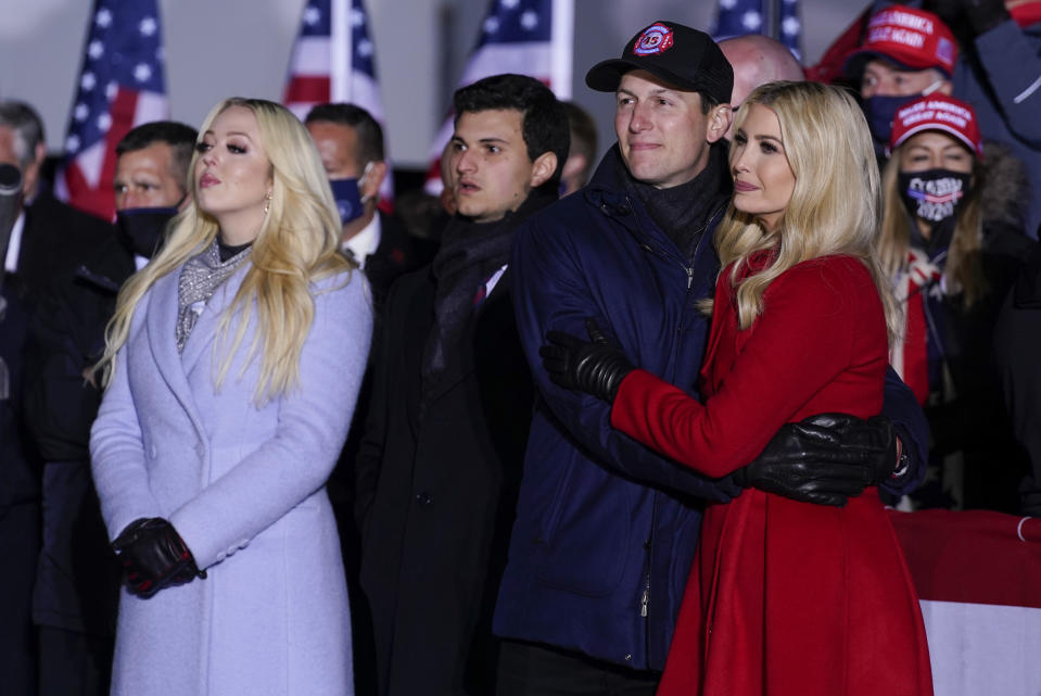 Tiffany Trump and Ivanka Trump and her husband Jared Kushner listen as President Donald Trump speaks during a campaign rally at Kenosha Regional Airport, Monday, Nov. 2, 2020, in Kenosha, Wis. (AP Photo/Evan Vucci)