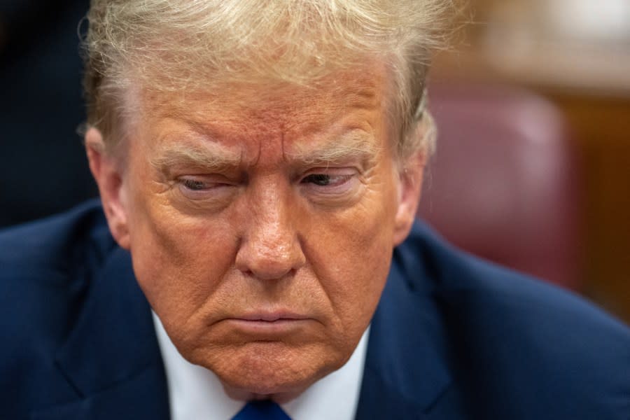 Former President Donald Trump awaits the start of proceedings during jury selection at Manhattan criminal court, Thursday, April 18, 2024 in New York. (Jeenah Moon/Pool Photo via AP)