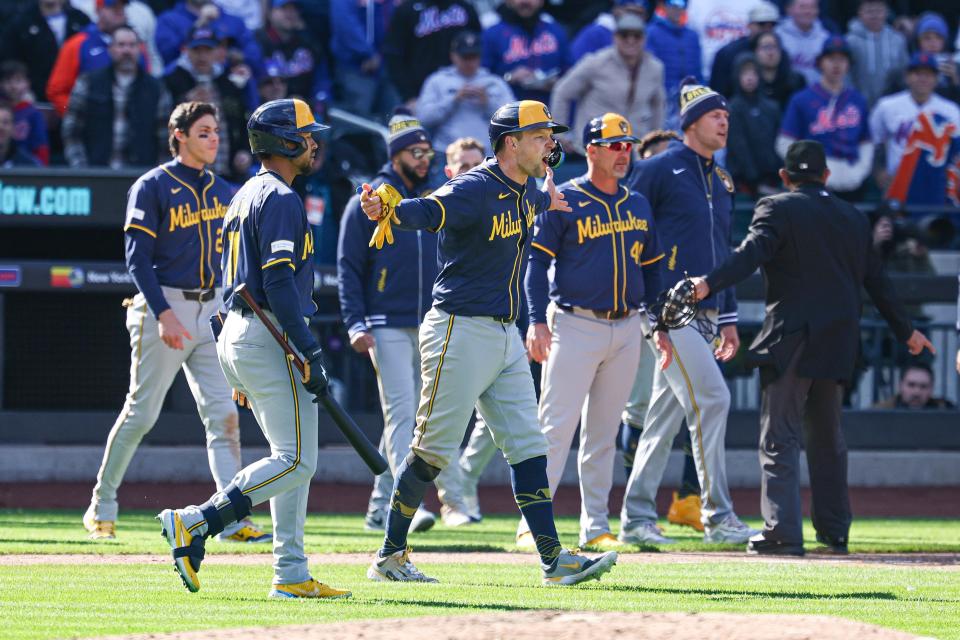 Mar 29, 2024; New York City, New York, USA; Milwaukee Brewers first baseman Rhys Hoskins (12) reacts as benches cleared while New York Mets second baseman Jeff McNeil (not pictured) argues a slide at second base during the seventh inning at Citi Field. Mandatory Credit: Vincent Carchietta-USA TODAY Sports