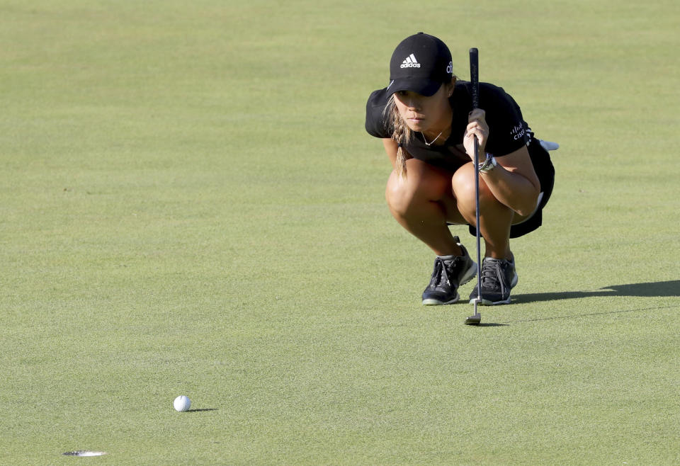 Danielle Kang of the United States lines up a putt during the second round of the BMW Ladies Championship at LPGA International Busan in Busan, South Korea, Friday, Oct. 22, 2021. (Cho Jung-ho/Yonhap via AP)