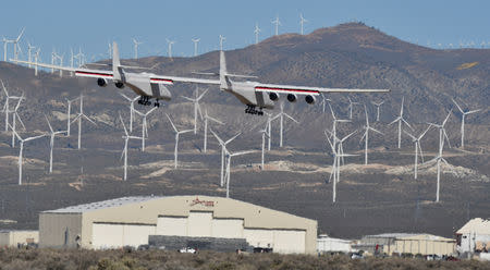 The world's largest airplane, built by the late Paul Allen's company Stratolaunch Systems, lands during its first test flight in Mojave, California, U.S. April 13, 2019. REUTERS/Gene Blevins