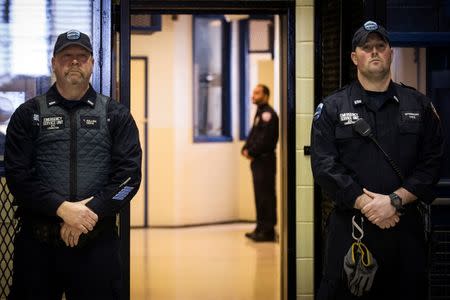 Corrections officers work in the Enhanced Supervision Housing Unit at the Rikers Island Correctional facility in New York March 12, 2015. REUTERS/Brendan McDermid