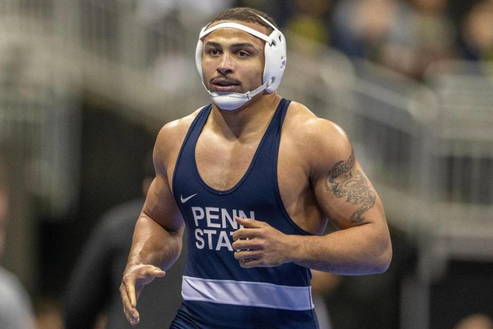 Aaron Brooks of Penn State University exits the mat following his victory over Evan Bates of Northwestern during the Men’s Division I NCAA Wrestling Championships at T-Mobile Center on Thursday, March 21, 2024, in Kansas City.