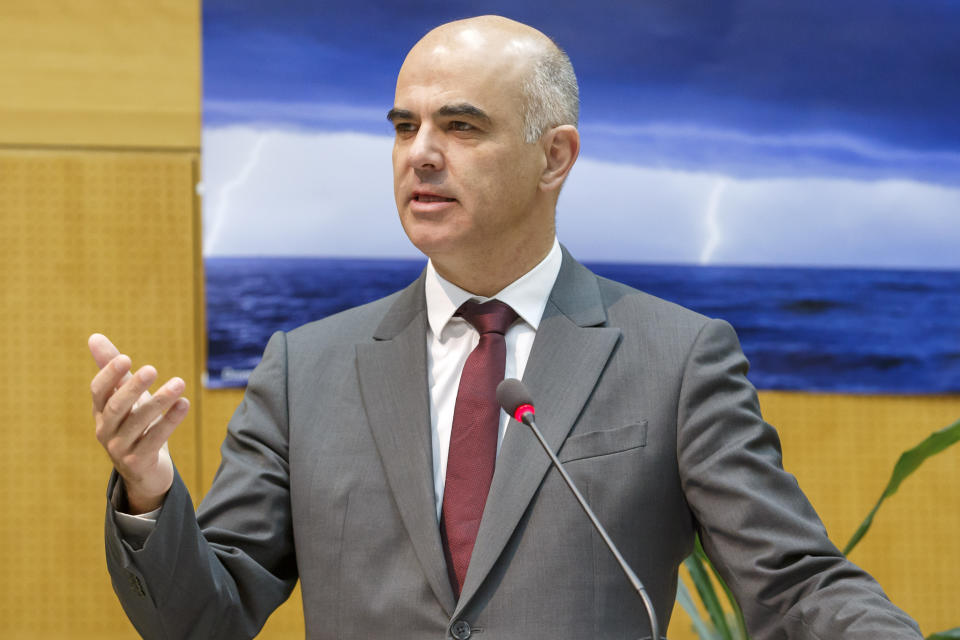 Swiss Interior Minister Alain Berset addresses his statement, during the opening of High Mountain Summit, at the headquarters World Meteorological Organization (WMO) in Geneva, Switzerland, Tuesday, Oct. 29, 2019. (Salvatore Di Nolfi/Keystone via AP)