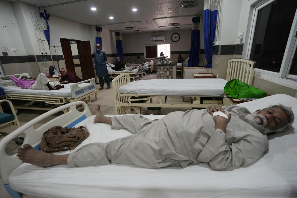 Men lie on beds in the cardiac ward of a hospital in Karachi, Pakistan, Thursday, Jan. 19, 2023. Pakistan has considerable control over infectious diseases but now struggles against cardiovascular diseases, diabetes and cancer as causes of early deaths, according to a new study published Thursday. (AP Photo/Fareed Khan)