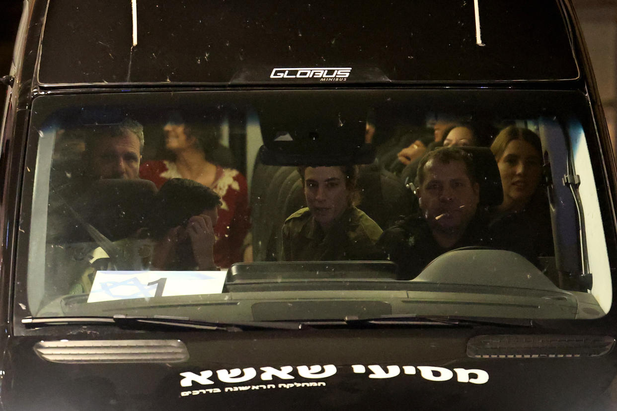 A vehicle carrying Israeli hostages released by Hamas from the Gaza Strip arrives at the Sheba Medical Center in Ramat Gan, early on November 26, 2023. Hamas on November 25, released a second group of Israeli and foreign civilians it had been holding hostage in the Gaza Strip in exchange for Palestinian prisoners, after an hours-long unexpected delay set nerves on edge. Israeli authorities said 13 Israelis and four Thai citizens had returned to Israel. (Photo by JACK GUEZ / AFP) (Photo by JACK GUEZ/AFP via Getty Images)